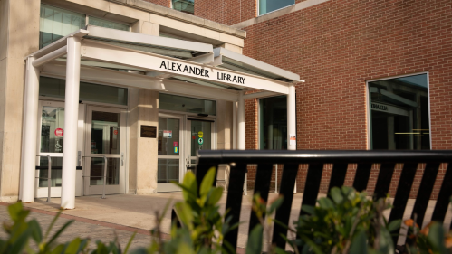 Entrance to Alexander Library as seen through bench