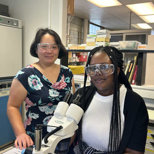 Jennifer Sun and Tia Hart in a lab.