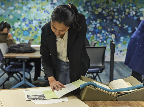 A student reviewing Special Collections materials in The Hatchery