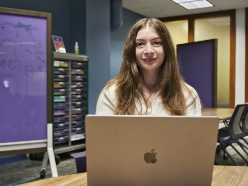 Image of Michelle Shlivko in The Hatchery sitting in front of a computer