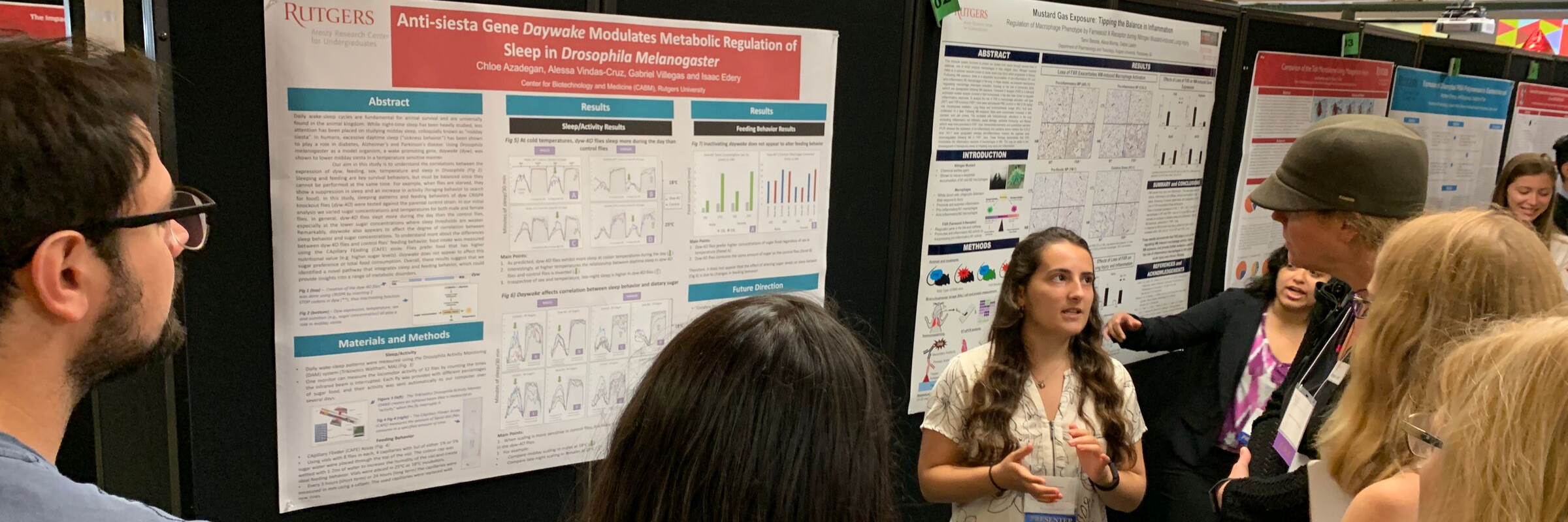 Summer Science student presenting her poster to judges and students during the 2019 summer session poster sessiobn. 