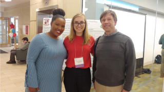 Mariya Galochkina, Tamiah Brevard, and Dr. Levin at the 2019 Symposium