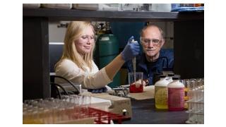 Aresty student working in the lab with faculty mentor. 